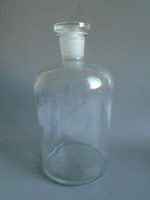 A large, corked apothecary bottle. 25.6 cm high.