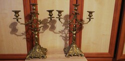 2 3-branched copper candlesticks with human figures
