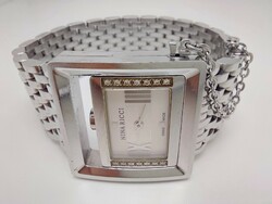 396T. Nina ricci diamond watch 0.14Ct with a strap connected around a special case