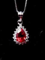 Beautiful silver pendant with a ruby gemstone