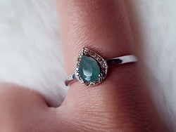 A beautiful silver ring with an emerald stone