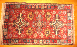 Antique hand-knotted wool rug