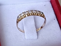 Women's gold ring with tiny zirconia stones 9k
