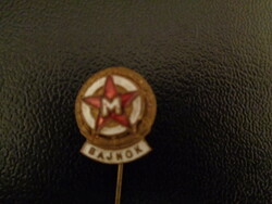 Champion, enamel badge