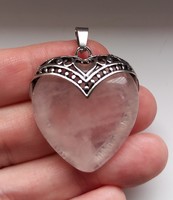 Natural rose quartz heart pendant.