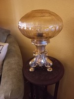 A beautifully crafted copper cast table lamp with a wonderful shade