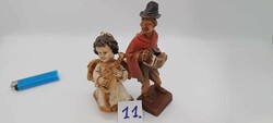 Lute-playing angel Christmas tree decoration and accordion-playing boy figure