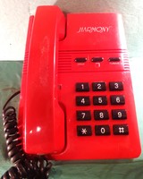 Wired, push-button phone/ red harmony model/. Desktop device, 15x22 cm.