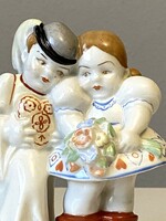 Zsolnay painted porcelain statue of András Sinkó and matyó couple in national costume in love