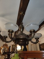 Antique solid copper chandelier with original polished shades from the 1930s. Its height is adjustable.