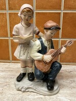 Young couple playing music