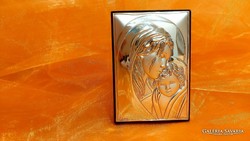 Silver-plated Italian icon, in a wooden frame. Mary with her child.