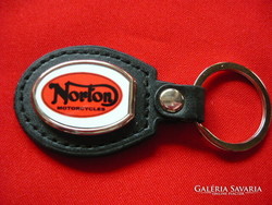 Norton oval metal key ring on a leather base