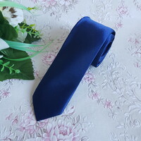 New, thinned dark blue satin tie