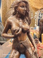 Female nude statue with incomplete clothing