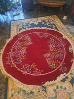 Knotted hand rug round