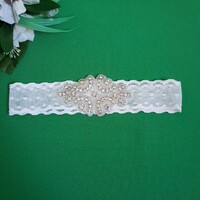 Off-white bridal garter with rhinestones, thigh lace