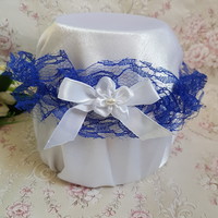 Purple lace bridal garter with white bows and flowers, thigh lace