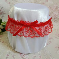 Bridal garter with red lace, red bow, thigh lace