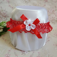 Bridal garter with red lace, red bow and flower, thigh lace