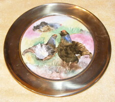 Wall plate with ceramic bird in copper frame