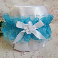 Bridal garter with turquoise lace, white bows and flowers, thigh lace