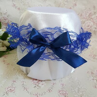 Purple lace bridal garter with dark blue bow, thigh lace