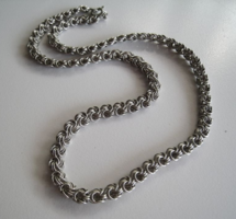 Old silver necklaces with rose braid