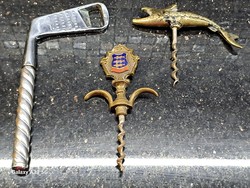 Wine opener trio: copper fish corkscrew, retro golf club imitation, and an old coat of arms opener with a patina