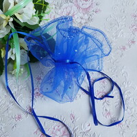 New, circular, shiny royal blue organza decorative bag, gift bag
