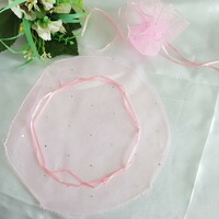 New, circular, shiny pink organza decorative bag, gift bag