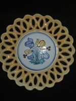 Painted plate with an openwork edge