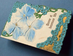 Antique embossed opening lace postcard with forget-me-not from 1910