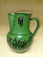 Green glazed ceramic jug