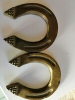Two small copper horseshoes found in the attic