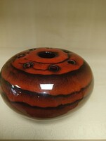 Round red black ikebana