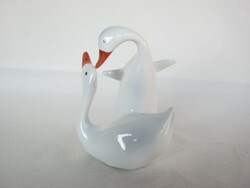 Couple of raven porcelain geese