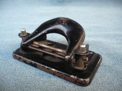 Old small table stapler and hole punch