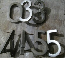 Old, metal door numbers in one - loft