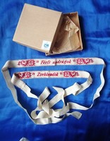 Old embroidered ribbon from a clothing store