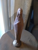 The terracotta Virgin is the work of the sculptor Aurél Káldor