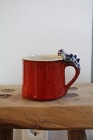 Dragon child ceramic mug - in red
