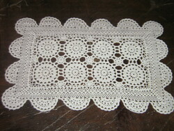 Hand-crocheted tablecloth with cute art nouveau features