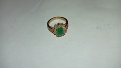 Gold-plated women's bijou ring with green stone