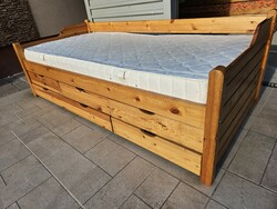 Pine bed for sale, in good condition, with drawers and linen rack.