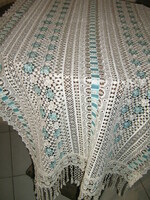 Beautiful vintage floral pattern with fringed lace tablecloth