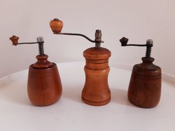 Old wooden pepper mills in a package