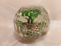Sheet-polished glass paperweight.