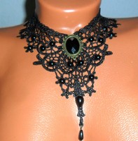 Gothic style collar made of blue black lace, with an antique effect pendant, glass drop, pearls. Adjustable.