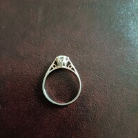 Silver ring with a sparkling stone